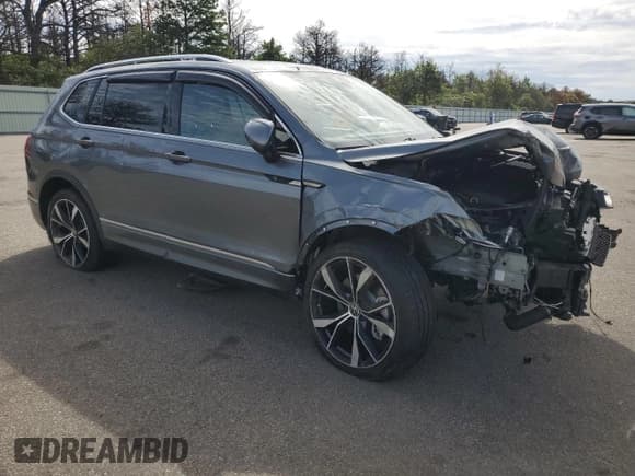 ✅ 2023 Volkswagen Tiguan SEL R-Line • VIN: 3VV4B7AX4PM128623 • Lot: 80810135. Listed on Copart with 14,154 mi. Free auction sales archive from the USA and detailed vehicle history report at DreamBid. Image 4.