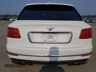 ✅ 2019 Bentley Bentayga V8 • VIN: SJAAM2ZV4KC026896 • Lot: 57332313. Wystawiony na Copart z przebiegiem Nie podano. Bezpłatny archiwum sprzedaży aukcyjnych z USA i szczegółowy raport historii pojazdu na DreamBid. Zdjęcie 6.