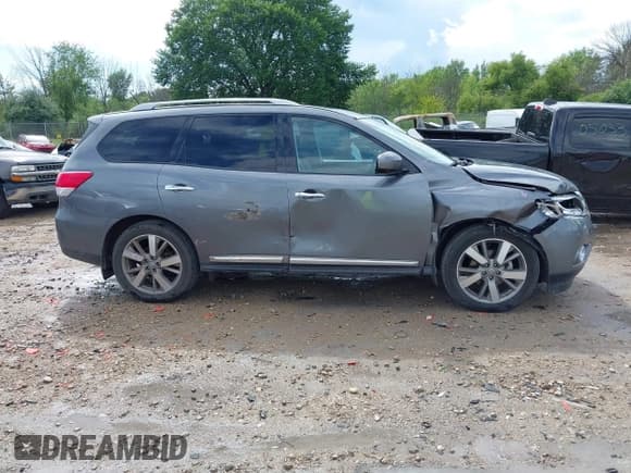 ✅ 2015 Nissan Pathfinder Platinum • VIN: 5N1AR2MM1FC704455 • Lot: 42783064. Listed on IAAI with 82,167 mi. Free auction sales archive from the USA and detailed vehicle history report at DreamBid. Image 14.