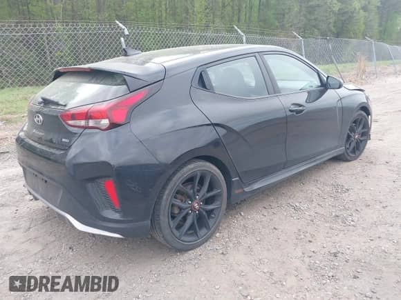 2019 Hyundai Veloster Turbo z VIN KMHTH6AB3KU020159, wystawiony jako IAAI lot #41954737 z przebiegiem 152 070 mil mil oraz . Historia ofert i sprzedaży dostępna na DreamBid. Obrazek 4.