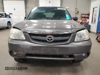 ✅ 2003 Mazda Tribute LX • VIN: 4F2YZ04173KM05549 • Lot: 86702895. Wystawiony na Copart z przebiegiem 128 757 mil. Bezpłatny archiwum sprzedaży aukcyjnych z USA i szczegółowy raport historii pojazdu na DreamBid. Zdjęcie 5.