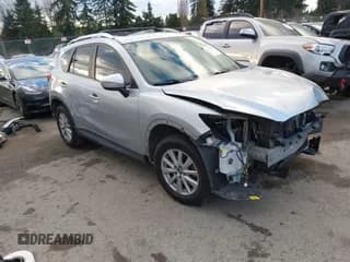 ✅ 2016 Mazda CX-5 Touring • VIN: JM3KE4CY0G0920652 • Lot: 43752375. Listed on IAAI with 110,326 mi. Free auction sales archive from the USA and detailed vehicle history report at DreamBid. Image 1.