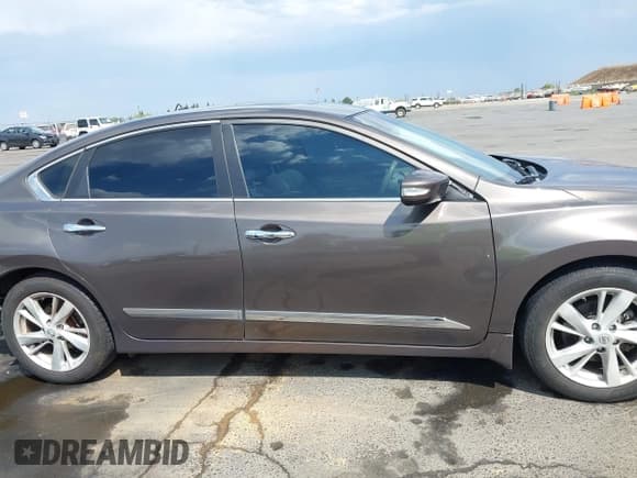 ✅ 2015 Nissan Altima S • VIN: 1N4AL3AP0FN352540 • Лот: 43079359. Опубликован ранее на IAAI с пробегом 129 344 миль. Бесплатный доступ к архиву аукционных продаж из США и подробный отчёт об истории автомобиля на DreamBid. Изображение 13.