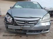 ✅ 2007 Honda Odyssey EX-L • VIN: 5FNRL38627B071088 • Лот: 43661014. Опубликован ранее на IAAI с пробегом 242 096 миль. Бесплатный доступ к архиву аукционных продаж из США и подробный отчёт об истории автомобиля на DreamBid. Изображение 13.