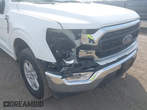✅ 2022 Ford F-150 XL • VIN: 1FTFW1E86NFB57498 • Lot: 43223589. Listed on IAAI with 63,536 mi. Free auction sales archive from the USA and detailed vehicle history report at DreamBid. Image 6.
