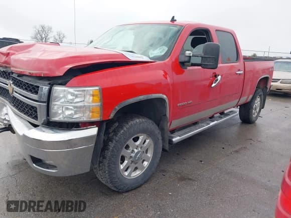 ✅ 2014 Chevrolet Silverado 2500HD LT • VIN: 1GC1KXC83EF123062 • Lot: 43737405. Listed on IAAI with 277,277 mi. Free auction sales archive from the USA and detailed vehicle history report at DreamBid. Image 2.