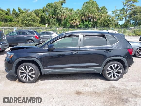 ✅ 2022 Volkswagen Taos SE • VIN: 3VVRX7B20NM035413 • Лот: 43280456. Опубликован ранее на IAAI с пробегом 95 276 миль. Бесплатный доступ к архиву аукционных продаж из США и подробный отчёт об истории автомобиля на DreamBid. Изображение 13.