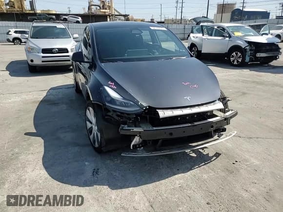 ✅ 2024 Tesla Model Y Long Range • VIN: 7SAYGDEE0RF024326 • Lot: 52149675. Listed on Copart with 34,503 mi. Free auction sales archive from the USA and detailed vehicle history report at DreamBid. Image 12.