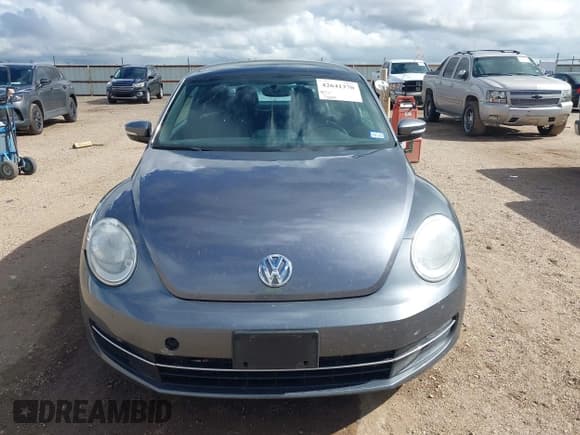 ✅ 2014 Volkswagen Beetle 2.0L TDI w/Sun/Sound/Nav • VIN: 3VWJL7ATXEM635807 • Лот: 42641370. Опубликован ранее на IAAI с пробегом 70 279 миль. Бесплатный доступ к архиву аукционных продаж из США и подробный отчёт об истории автомобиля на DreamBid. Изображение 12.