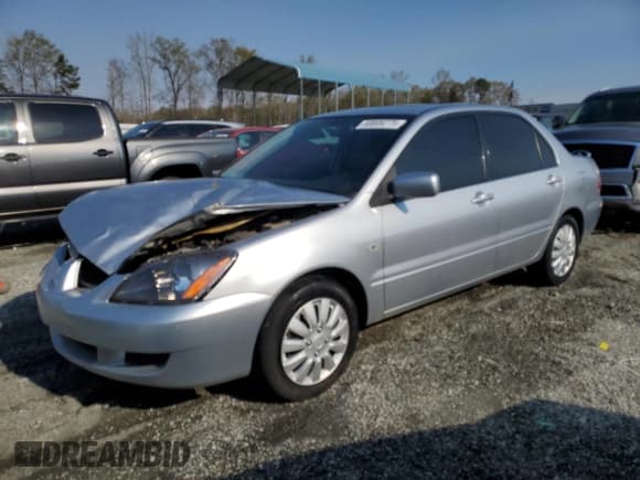 ✅ 2004 Mitsubishi Lancer LS • VIN: JA3AJ36E24U020656 • Lot: 50809275. Listed on Copart with 214,332 mi. Free auction sales archive from the USA and detailed vehicle history report at DreamBid. Image 1.