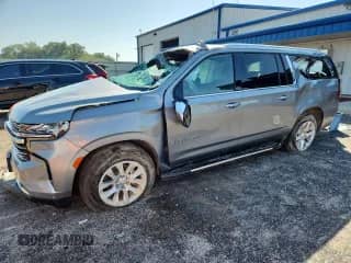 2023 Chevrolet Suburban Premier with VIN 1GNSKFKD5PR527860, listed as a Copart auction lot 83814055 with 48,305 mi miles and Salvage title. Bid and sale history available at DreamBid. Image 1.