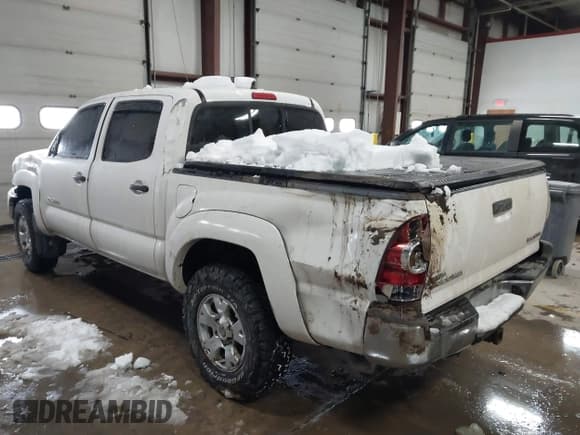 ✅ 2012 Toyota Tacoma • VIN: 3TMLU4EN9CM086455 • Lot: 41398671. Listed on IAAI with 241,138 mi. Free auction sales archive from the USA and detailed vehicle history report at DreamBid. Image 3.