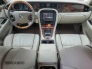 ✅ 2004 Jaguar XJ • VIN: SAJEA74C64SG08121 • Lot: 81736984. Listed on Copart with 100,144 mi. Free auction sales archive from the USA and detailed vehicle history report at DreamBid. Image 8.