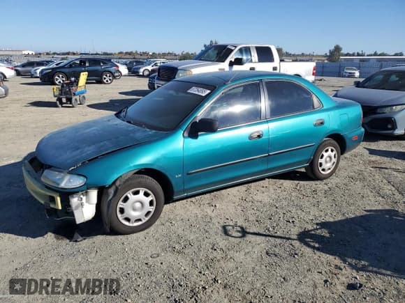 ✅ 1996 Mazda Protege DX • VIN: JM1BB1417T0332534 • Lot: 87264895. Wystawiony na Copart z przebiegiem 178 862 mil. Bezpłatny archiwum sprzedaży aukcyjnych z USA i szczegółowy raport historii pojazdu na DreamBid. Zdjęcie 1.