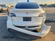 ✅ 2023 Tesla Model Y Long Range • VIN: 7SAYGAEEXPF925408 • Lot: 68682505. Wystawiony na Copart z przebiegiem 24 574 mil. Bezpłatny archiwum sprzedaży aukcyjnych z USA i szczegółowy raport historii pojazdu na DreamBid. Zdjęcie 6.