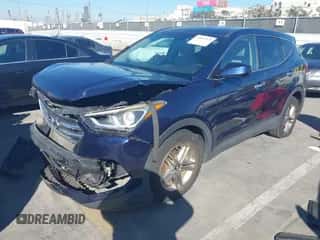 2017 Hyundai Santa Fe 2.4L z VIN 5XYZT3LB6HG467586, wystawiony jako IAAI lot #43585328 z przebiegiem 84 065 mil mil oraz . Historia ofert i sprzedaży dostępna na DreamBid. Obrazek 2.