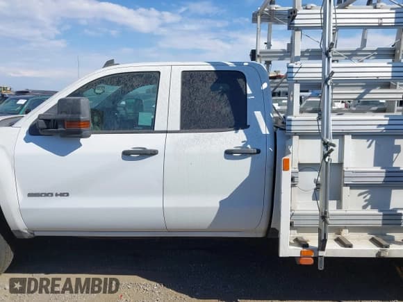 ✅ 2019 Chevrolet Silverado 2500HD Work Truck • VIN: 2GC2CREG1K1124277 • Лот: 43163771. Опубликован ранее на IAAI с пробегом 244 988 миль. Бесплатный доступ к архиву аукционных продаж из США и подробный отчёт об истории автомобиля на DreamBid. Изображение 14.