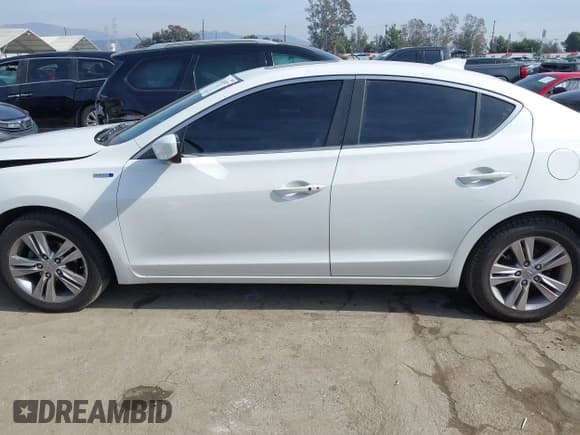 ✅ 2013 Acura ILX Hybrid Technology • VIN: 19VDE3F78DE301100 • Лот: 41476957. Опубликован ранее на IAAI с пробегом 121 487 миль. Бесплатный доступ к архиву аукционных продаж из США и подробный отчёт об истории автомобиля на DreamBid. Изображение 14.