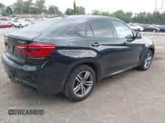 ✅ 2016 BMW X6 xDrive50i • VIN: 5UXKU6C55G0R34087 • Лот: 42866264. Опубликован ранее на IAAI с пробегом 90 912 миль. Бесплатный доступ к архиву аукционных продаж из США и подробный отчёт об истории автомобиля на DreamBid. Изображение 4.
