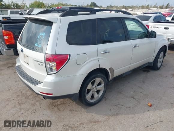 ✅ 2010 Subaru Forester XT Limited • VIN: JF2SH6FC5AH730013 • Lot: 43498711. Listed on IAAI with 174,853 mi. Free auction sales archive from the USA and detailed vehicle history report at DreamBid. Image 4.