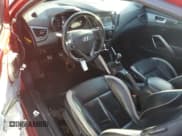 ✅ 2013 Hyundai Veloster Turbo • VIN: KMHTC6AE4DU179641 • Lot: 85915125. Listed on Copart with 95,967 mi. Free auction sales archive from the USA and detailed vehicle history report at DreamBid. Image 8.