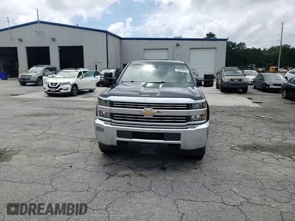 2017 Chevrolet Silverado 2500HD Work Truck with VIN 1GC2KUEG4HZ365658, listed as a Copart auction lot 68069045 with 233,573 mi miles and Salvage title. Bid and sale history available at DreamBid. Image 14.