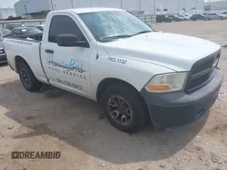 ✅ 2012 Ram 1500 ST • VIN: 3C6JD6AP2CG277134 • Lot: 42305500. Listed on IAAI with 182,671 mi. Free auction sales archive from the USA and detailed vehicle history report at DreamBid. Image 1.