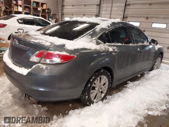 ✅ 2010 Mazda 6 i Touring • VIN: 1YVHZ8CH6A5M17713 • Lot: 43817977. Listed on IAAI with 182,469 mi. Free auction sales archive from the USA and detailed vehicle history report at DreamBid. Image 4.
