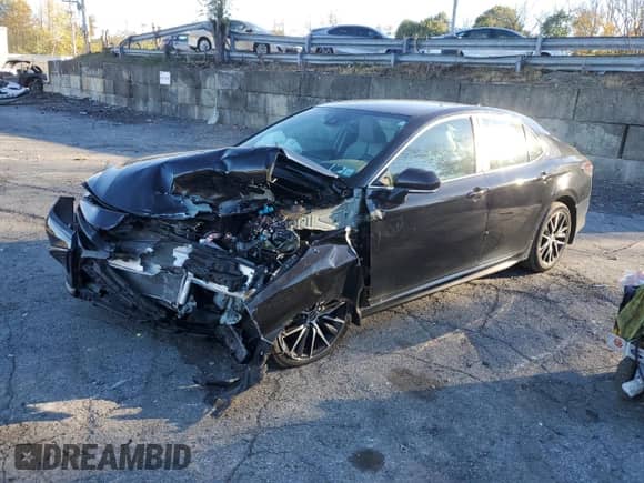 2023 Toyota Camry SE with VIN 4T1G11BK2PU104875, listed as a Copart auction lot 86991655 with 21,963 mi miles and Salvage title. Bid and sale history available at DreamBid. Image 1.