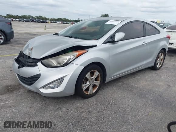 ✅ 2013 Hyundai Elantra GS • VIN: KMHDH6AE5DU018947 • Lot: 43647741. Listed on IAAI with 87,385 mi. Free auction sales archive from the USA and detailed vehicle history report at DreamBid. Image 2.