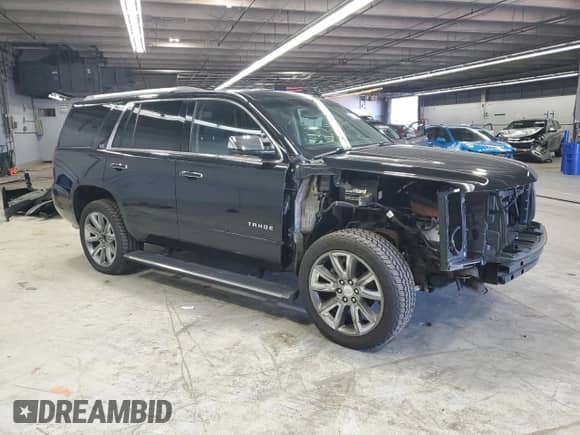 2015 Chevrolet Tahoe LTZ с VIN 1GNSKCKC4FR691752, выставлен на аукционе Copart как лот 71042015 с пробегом 100 534 миль миль и Списание • Salvage title. История ставок и продаж доступна на DreamBid. Изображение 4.