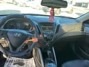 ✅ 2013 Hyundai Veloster Turbo • VIN: KMHTC6AE7DU115884 • Lot: 84959054. Wystawiony na Copart z przebiegiem 152 133 mil. Bezpłatny archiwum sprzedaży aukcyjnych z USA i szczegółowy raport historii pojazdu na DreamBid. Zdjęcie 9.