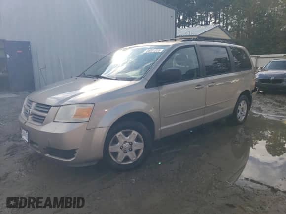 2009 Dodge Grand Caravan SE with VIN 2D8HN44E79R651812, listed as a Copart auction lot 85851955 with 253,916 mi miles and Salvage title. Bid and sale history available at DreamBid. Image 1.