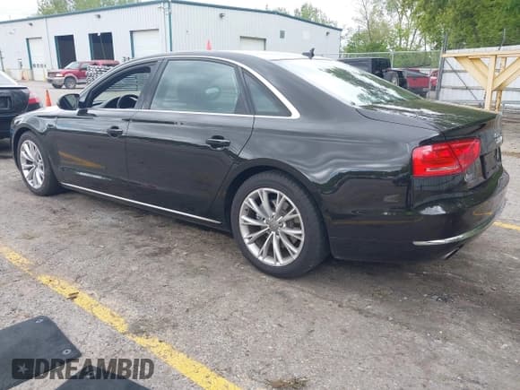 ✅ 2013 Audi A8 3.0L • VIN: WAURGAFD8DN012938 • Lot: 42334901. Listed on IAAI with 64,235 mi. Free auction sales archive from the USA and detailed vehicle history report at DreamBid. Image 3.