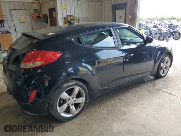 2014 Hyundai Veloster z VIN KMHTC6AD1EU185924, wystawiony jako Copart lot #67472874 z przebiegiem 161 871 mil mil oraz Czysty tytuł • Clean title. Historia ofert i sprzedaży dostępna na DreamBid. Obrazek 3.