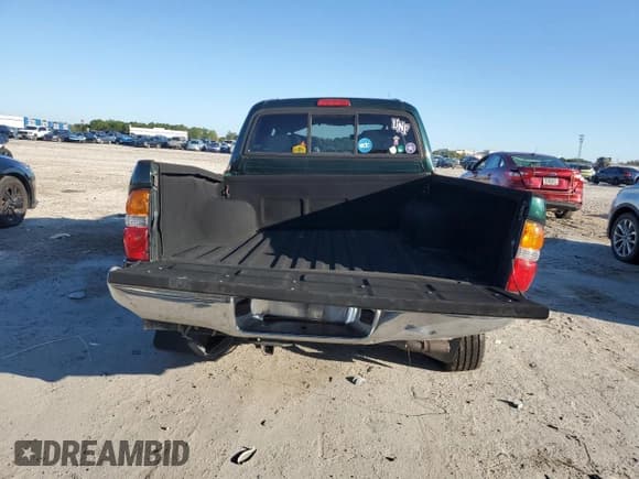 ✅ 2003 Toyota Tacoma PreRunner • VIN: 5TEGN92N33Z151299 • Lot: 87075315. Listed on Copart with 129,370 mi. Free auction sales archive from the USA and detailed vehicle history report at DreamBid. Image 6.
