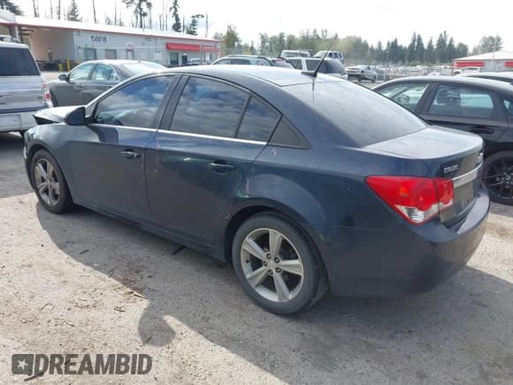 ✅ 2014 Chevrolet Cruze 2LT • VIN: 1G1PE5SBXE7380077 • Lot: 43012675. Listed on IAAI with 152,558 mi. Free auction sales archive from the USA and detailed vehicle history report at DreamBid. Image 3.