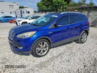 ✅ 2014 Ford Escape Titanium • VIN: 1FMCU0J94EUA30094 • Lot: 94826385. Wystawiony na Copart z przebiegiem 138 420 mil. Bezpłatny archiwum sprzedaży aukcyjnych z USA i szczegółowy raport historii pojazdu na DreamBid. Zdjęcie 1.