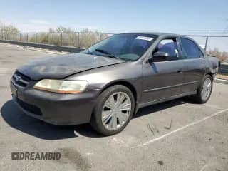 1999 Honda Accord LX z VIN JHMCG5643XC051063, wystawiony jako Copart lot #68949065 z przebiegiem 135 815 mil mil oraz Szkoda całkowita • Salvage title. Historia ofert i sprzedaży dostępna na DreamBid. Obrazek 1.