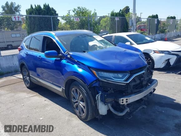 ✅ 2020 Honda CR-V Touring • VIN: 7FARW1H97LE011473 • Lot: 42368050. Listed on IAAI with 84,425 mi. Free auction sales archive from the USA and detailed vehicle history report at DreamBid. Image 1.