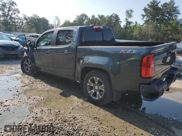 ✅ 2020 Chevrolet Colorado 2WD Z71 • VIN: 1GCGSDEN4L1135341 • Лот: 68313164. Опубликован ранее на Copart с пробегом 57 079 миль. Бесплатный доступ к архиву аукционных продаж из США и подробный отчёт об истории автомобиля на DreamBid. Изображение 2.