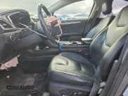 ✅ 2014 Ford Fusion Titanium Hybrid • VIN: 3FA6P0RU5ER398119 • Lot: 92226625. Wystawiony na Copart z przebiegiem 208 179 mil. Bezpłatny archiwum sprzedaży aukcyjnych z USA i szczegółowy raport historii pojazdu na DreamBid. Zdjęcie 7.