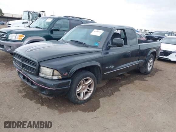 1999 Dodge Dakota Sport with VIN 1B7GL22ZXXS129018, listed as a IAAI auction lot 42050078 with 133,241 mi miles and . Bid and sale history available at DreamBid. Image 2.