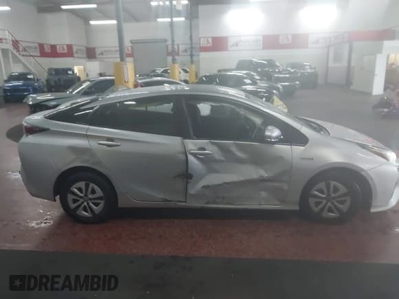 ✅ 2018 Toyota Prius Two • VIN: JTDKBRFU2J3060010 • Lot: 43721356. Wystawiony na IAAI z przebiegiem 144 169 mil. Bezpłatny archiwum sprzedaży aukcyjnych z USA i szczegółowy raport historii pojazdu na DreamBid. Zdjęcie 13.