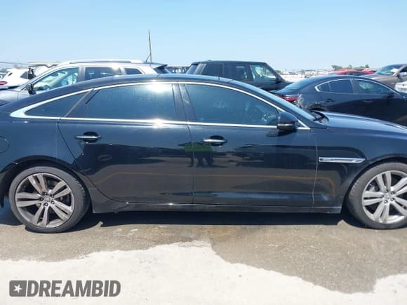 ✅ 2011 Jaguar XJ XJL • VIN: SAJWA2GBXBLV15651 • Лот: 43173257. Опубликован ранее на IAAI с пробегом 87 838 миль. Бесплатный доступ к архиву аукционных продаж из США и подробный отчёт об истории автомобиля на DreamBid. Изображение 13.