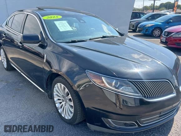 ✅ 2015 Lincoln MKS • VIN: 1LNHL9DK7FG602531 • Lot: 84918005. Wystawiony na Copart z przebiegiem 162 977 mil. Bezpłatny archiwum sprzedaży aukcyjnych z USA i szczegółowy raport historii pojazdu na DreamBid. Zdjęcie 1.