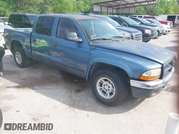 ✅ 2002 Dodge Dakota SLT • VIN: 1B7HL48XX2S651047 • Lot: 42024449. Wystawiony na IAAI z przebiegiem 138 903 mil. Bezpłatny archiwum sprzedaży aukcyjnych z USA i szczegółowy raport historii pojazdu na DreamBid. Zdjęcie 1.