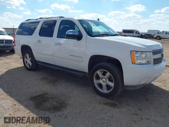2008 Chevrolet Suburban LTZ z VIN 1GNFK16318R127690, wystawiony jako IAAI lot #43424584 z przebiegiem 278 244 mil mil oraz . Historia ofert i sprzedaży dostępna na DreamBid. Obrazek 1.