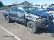 ✅ 2021 Toyota Tacoma SR • VIN: 3TMCZ5AN2MM387079 • Lot: 42164603. Listed on IAAI with 42,794 mi. Free auction sales archive from the USA and detailed vehicle history report at DreamBid. Image 1.