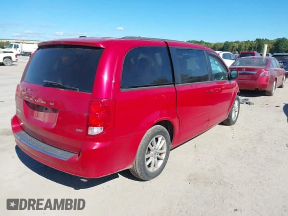 ✅ 2014 Dodge Grand Caravan SXT • VIN: 2C4RDGCGXER149980 • Lot: 43419248. Listed on IAAI with 87,562 mi. Free auction sales archive from the USA and detailed vehicle history report at DreamBid. Image 4.